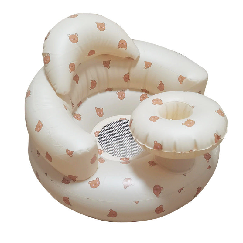 White baby bath seat with teddy bear pattern on a white background