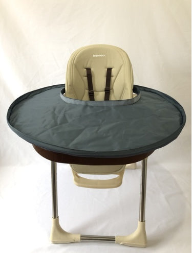 High chair with a tray on a white background