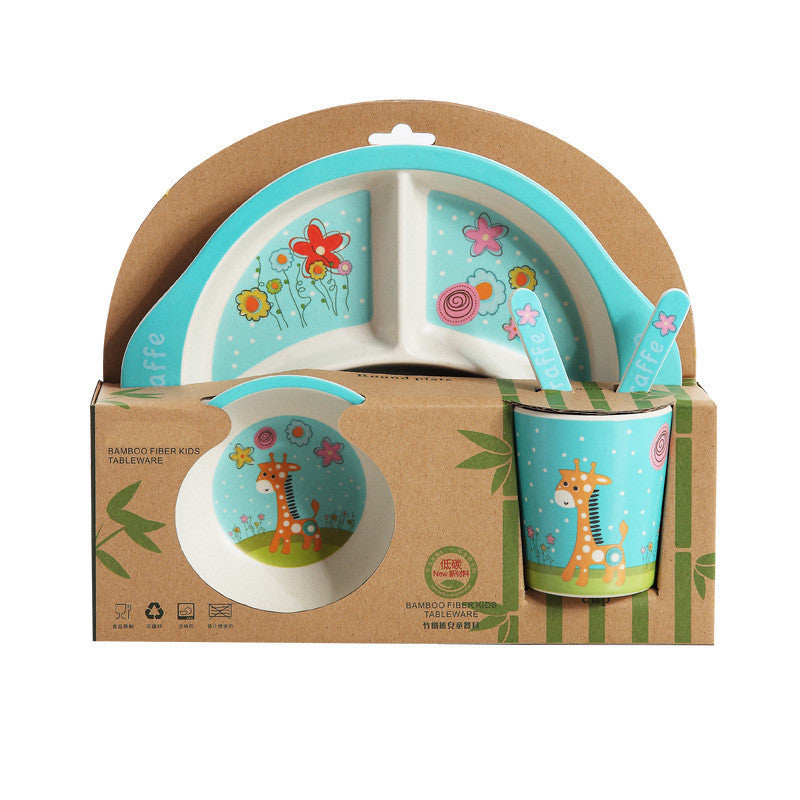 Children's dinner set with plate, cup, and spoon in a cardboard box on a white background