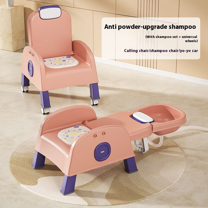 Pink and purple children's chair with a built-in sink on a beige floor.