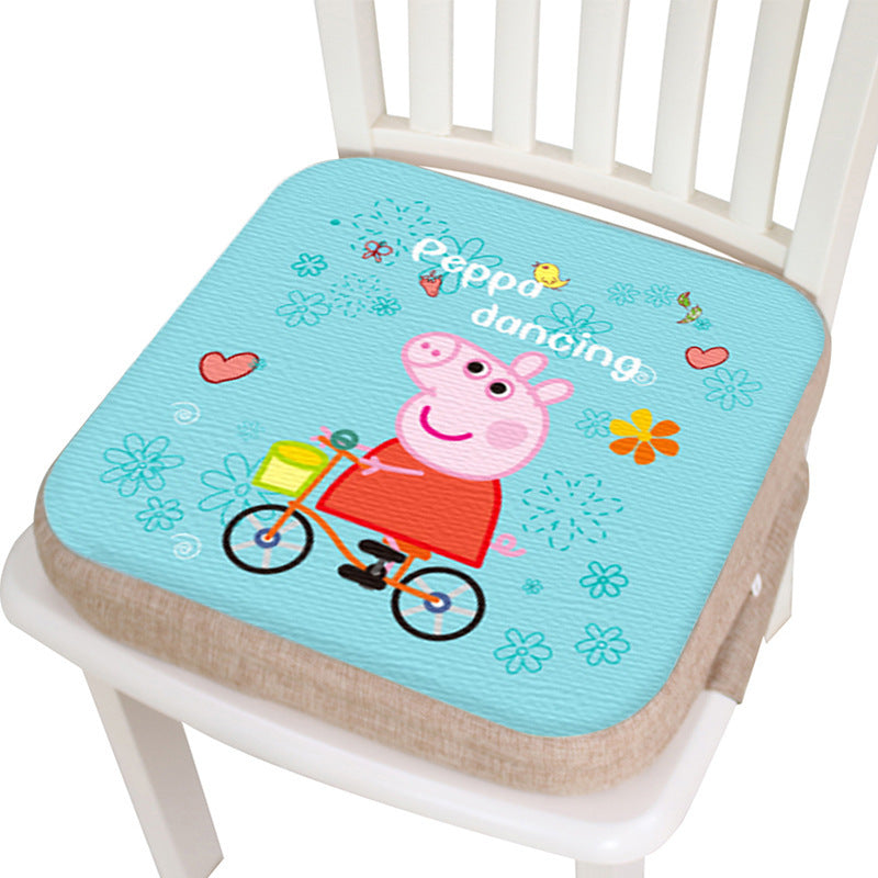 Colorful chair cushion with Peppa Pig design on a white chair