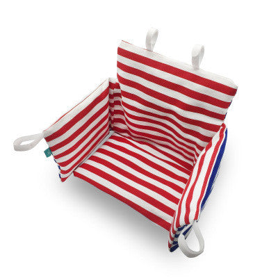 Red and white striped pet hammock on a white background