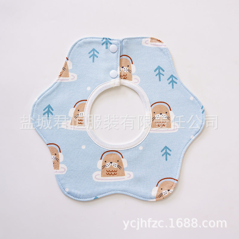 Baby bib with cartoon design on a light blue background