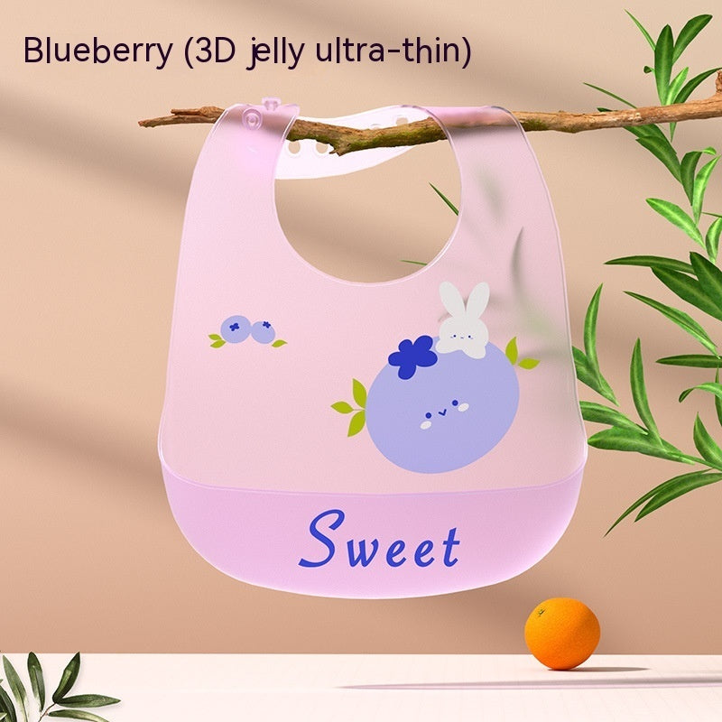 Pink bib with blueberry design and 'Sweet' text on a beige background with an orange and plant elements.