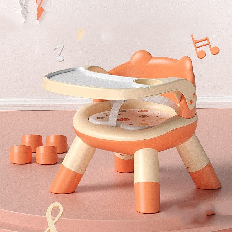 Children's chair with a small table on a pink floor