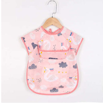 Pink baby bib with cloud pattern on a wooden hanger against a white background