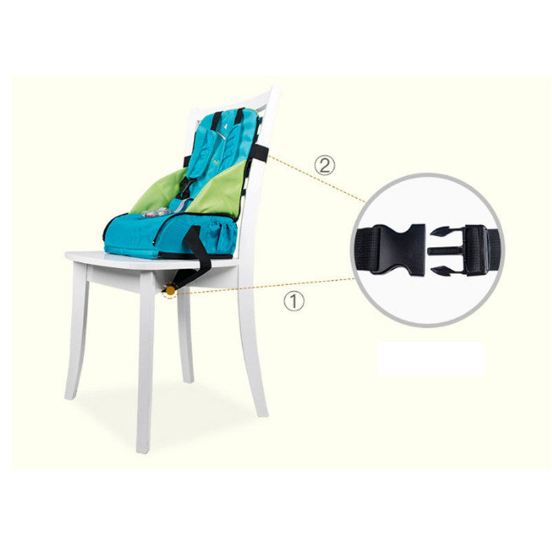 Child safety seat on a chair with a close-up of the buckle mechanism.