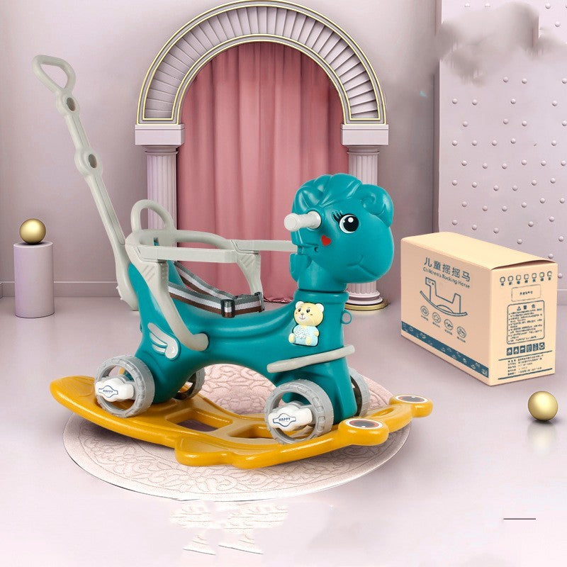 Children's toy horse with teal body and yellow feet on a white surface.