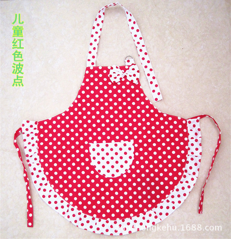 Red apron with white polka dots on a beige background