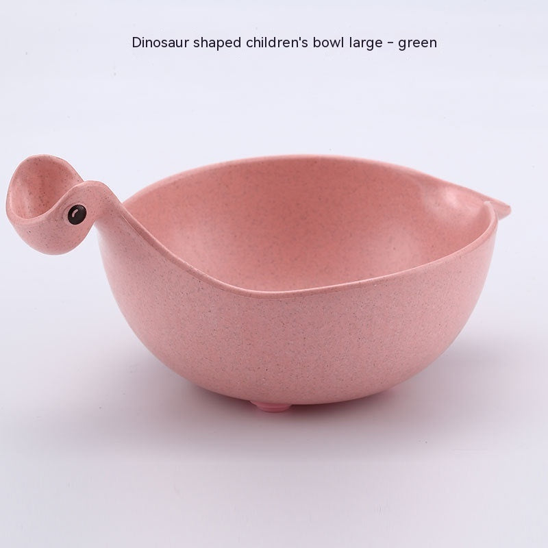 Pink dinosaur-shaped children's bowl on a white background
