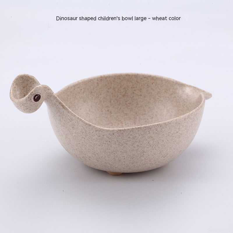 Dinosaur-shaped children's bowl in wheat color on a white background