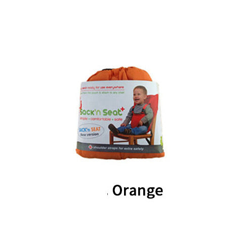 Orange child safety seat with packaging on a white background