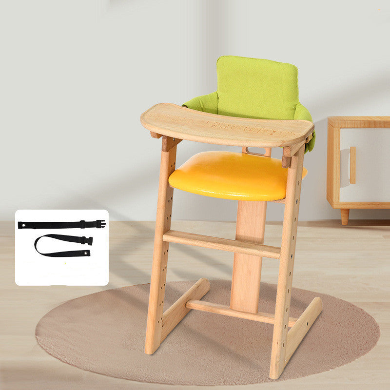 Wooden high chair with green cushion and yellow seat on a neutral background