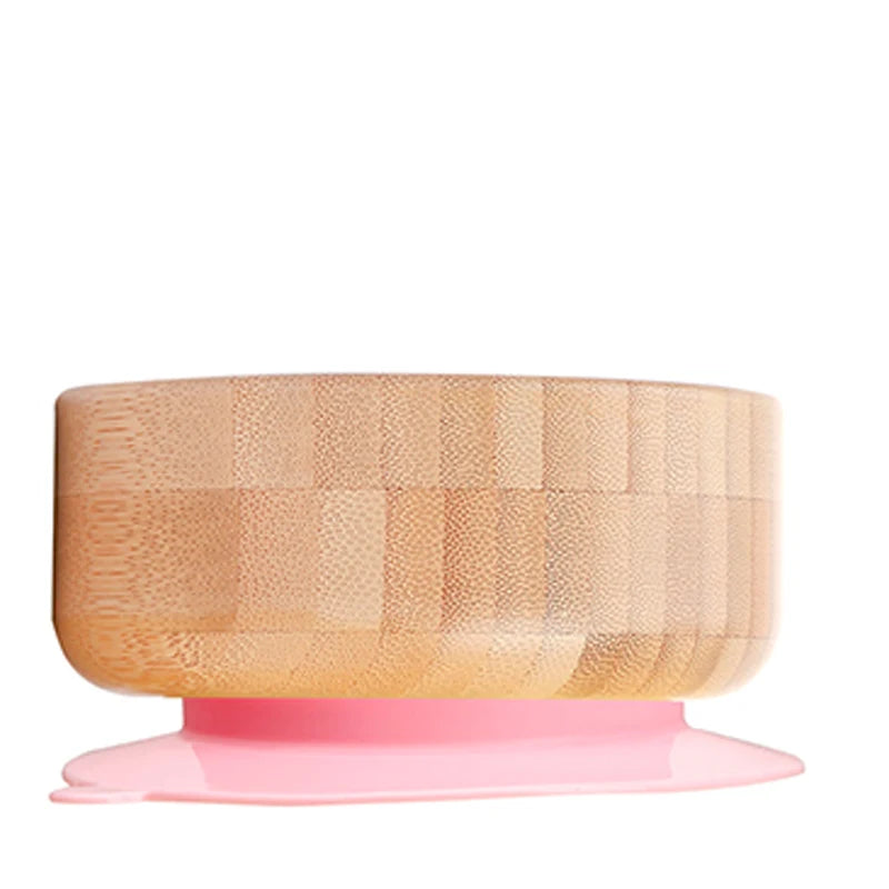 Wooden bowl with pink base on a white background