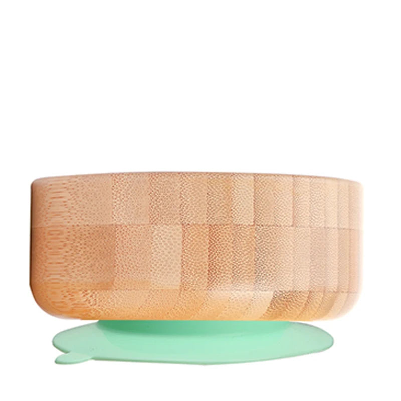 Wooden bowl with a green base on a white background