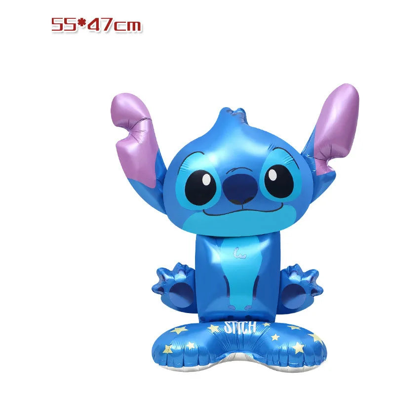Inflatable character resembling a blue creature with purple accents on a white background