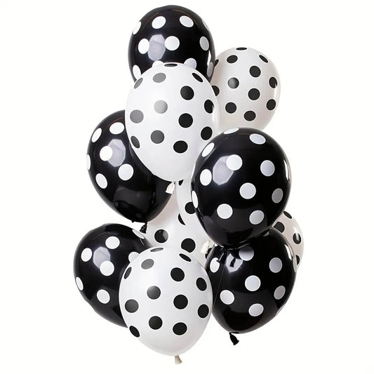 Bunch of black and white polka dot balloons on a white background
