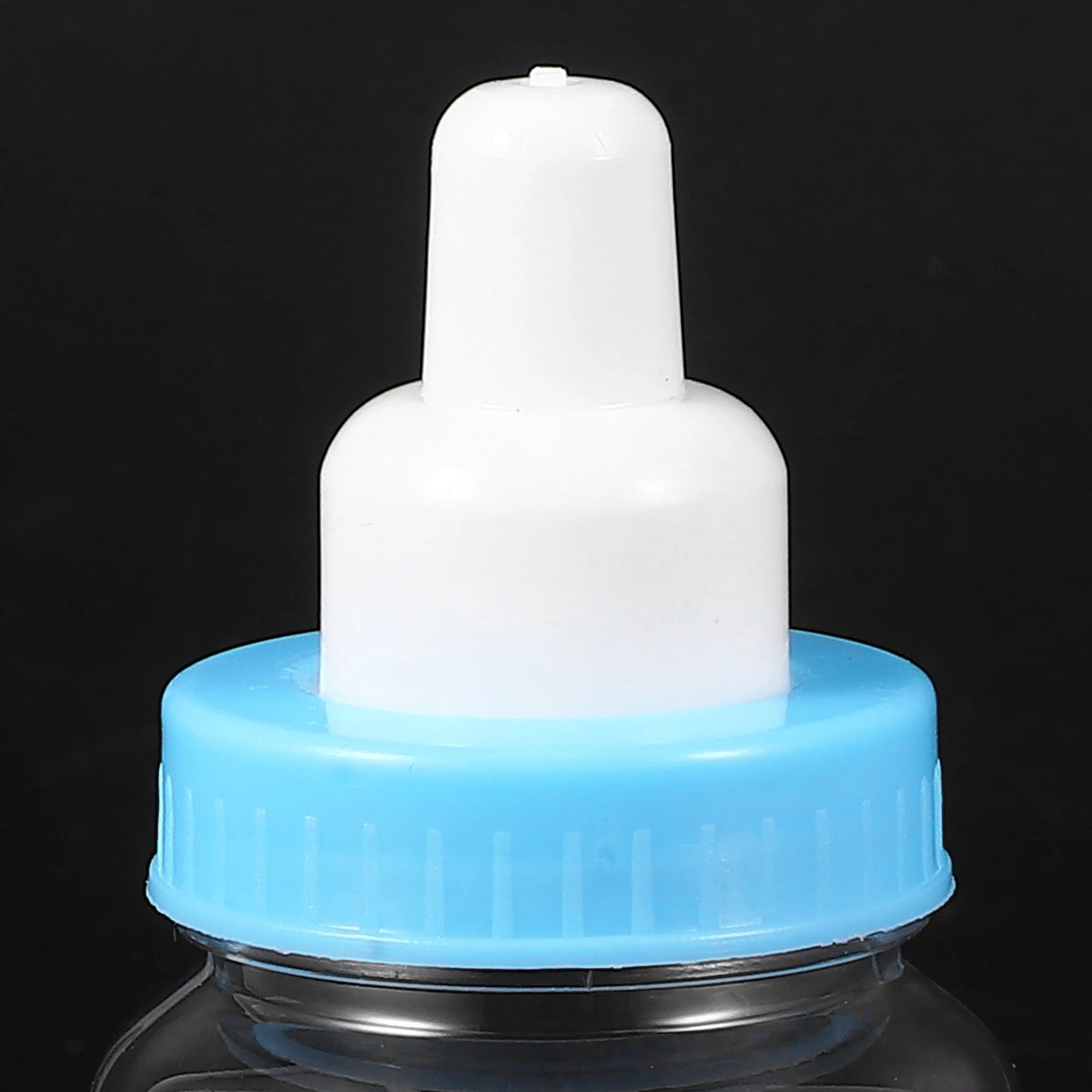 White bottle cap with blue base on a black background