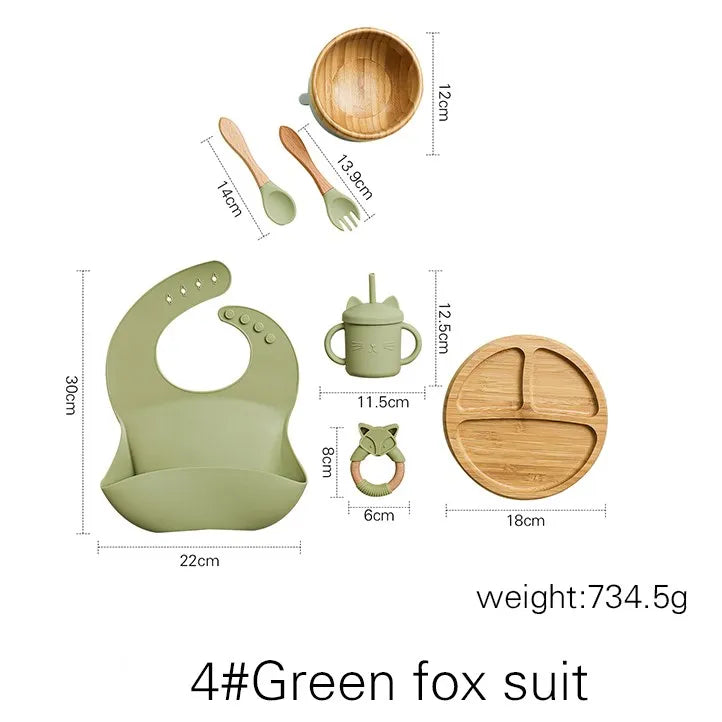 Baby feeding utensils set with measurements and weight on a white background