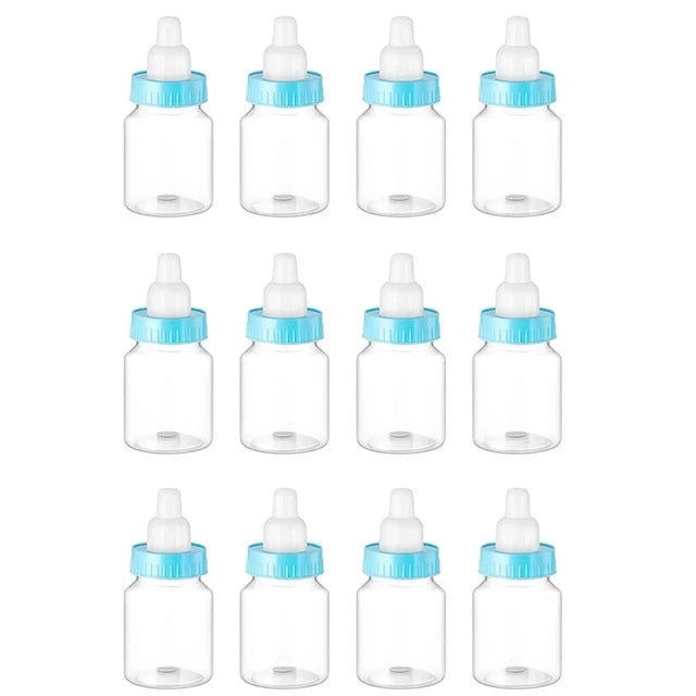 Set of clear baby bottles with blue caps on a white background