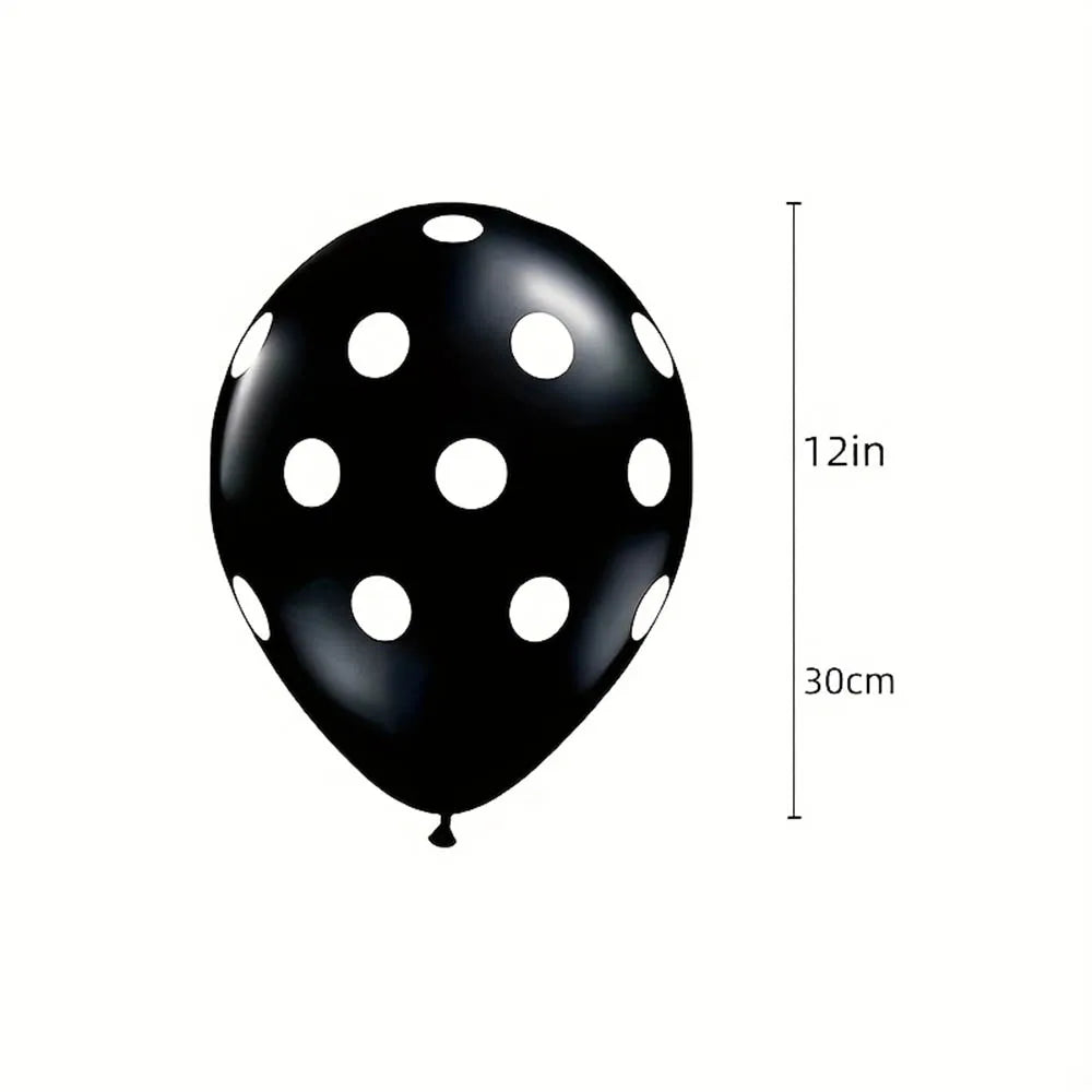 Black balloon with white polka dots and measurement details on a white background