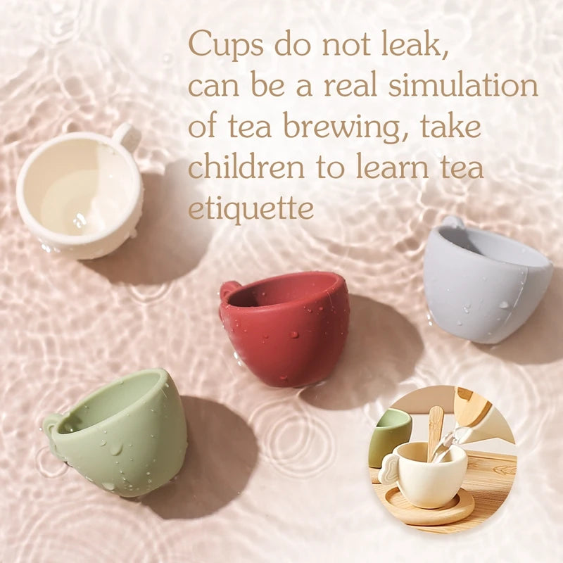 Colorful silicone tea cups on a textured surface with text about their features.