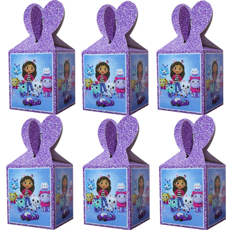 Set of six Dora the Explorer-themed favor boxes with purple glittery handles on a white background.