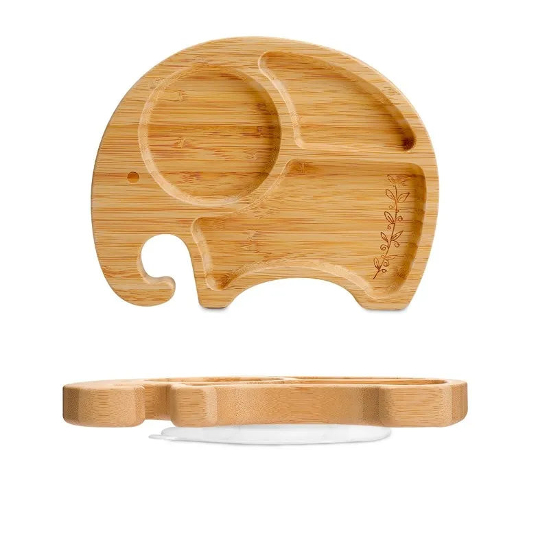 Wooden elephant-shaped tray with a white base on a white background