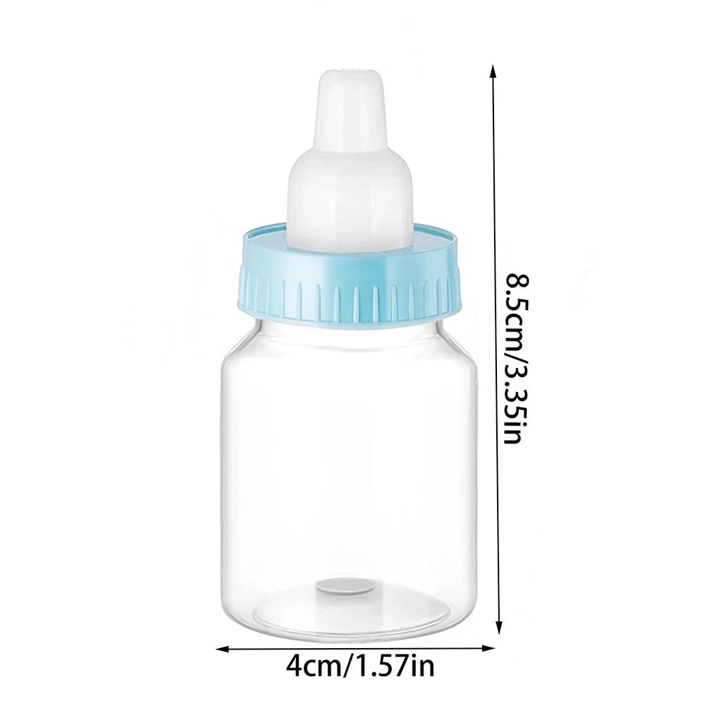 Clear baby bottle with blue cap and measurements on a white background