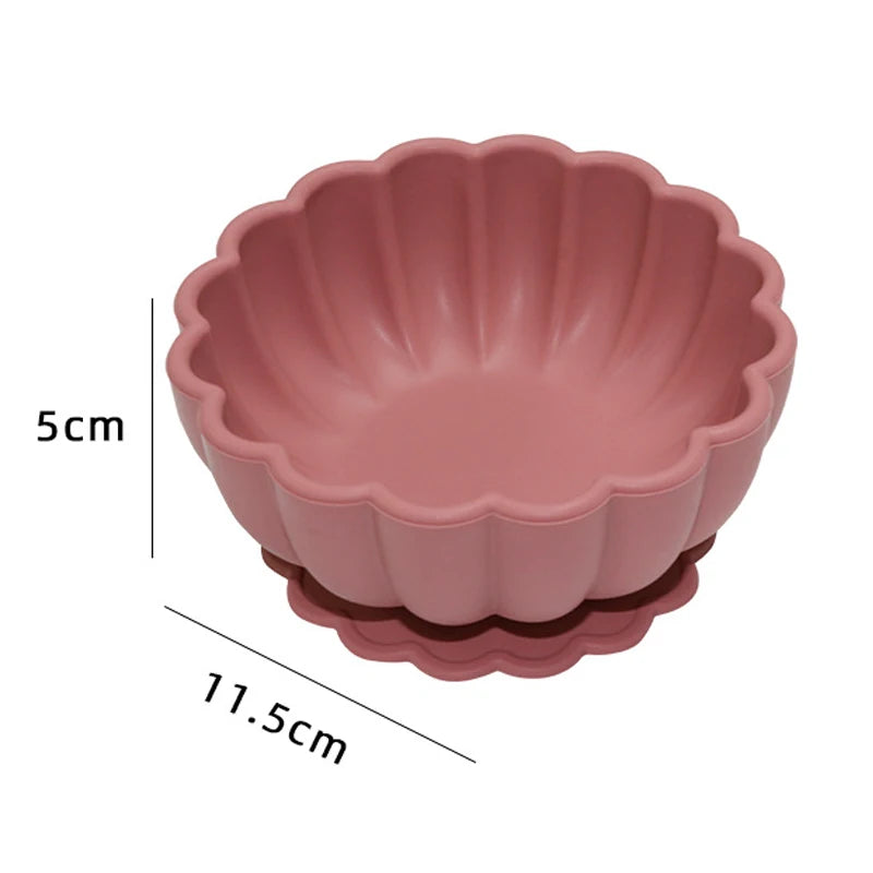 Pink scalloped-edge bowl with dimensions on a white background