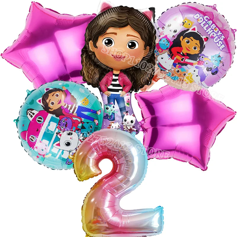 Set of Dora the Explorer-themed balloons including a number '2' balloon and character face.