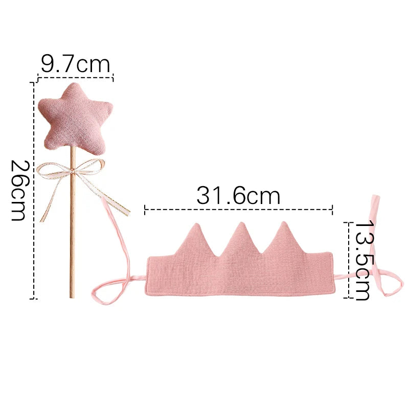 Measurement chart of a pink star wand and crown on a white background