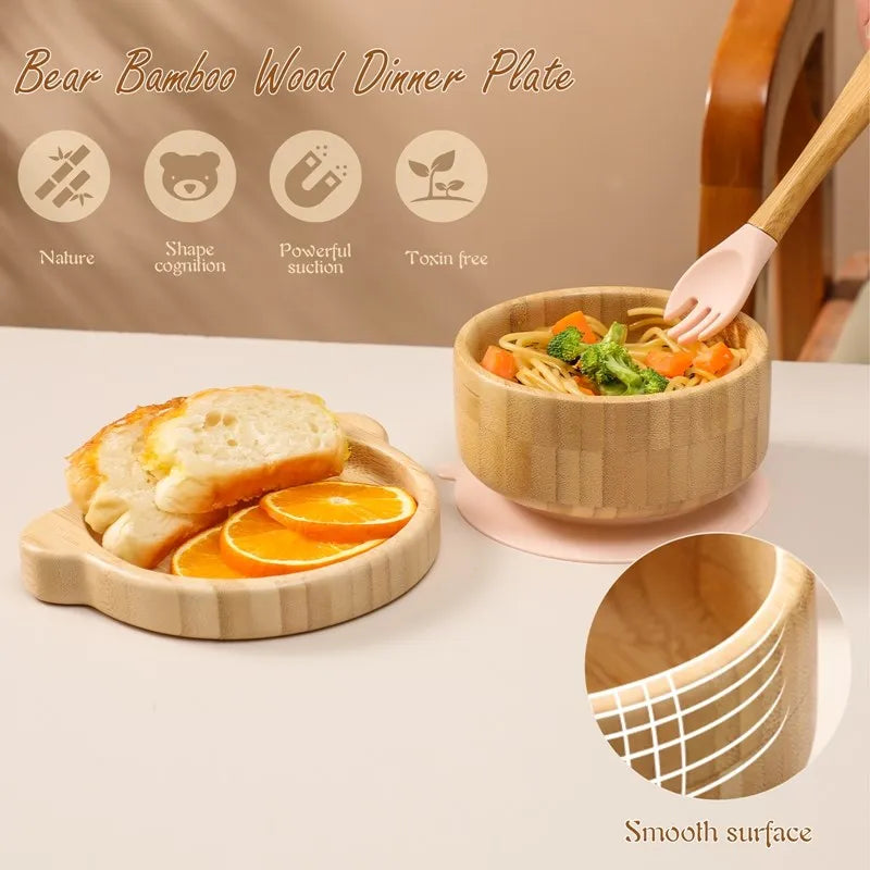 Bamboo wood dinner plate with food and bread on a white surface