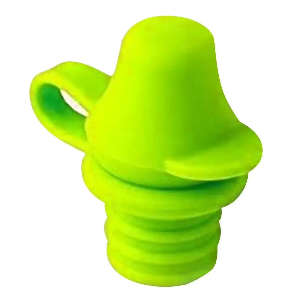 Green silicone bottle stopper on a white background