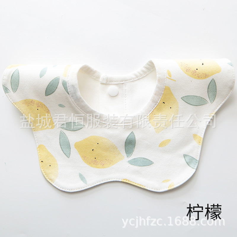 Baby bib with lemon pattern on a white background