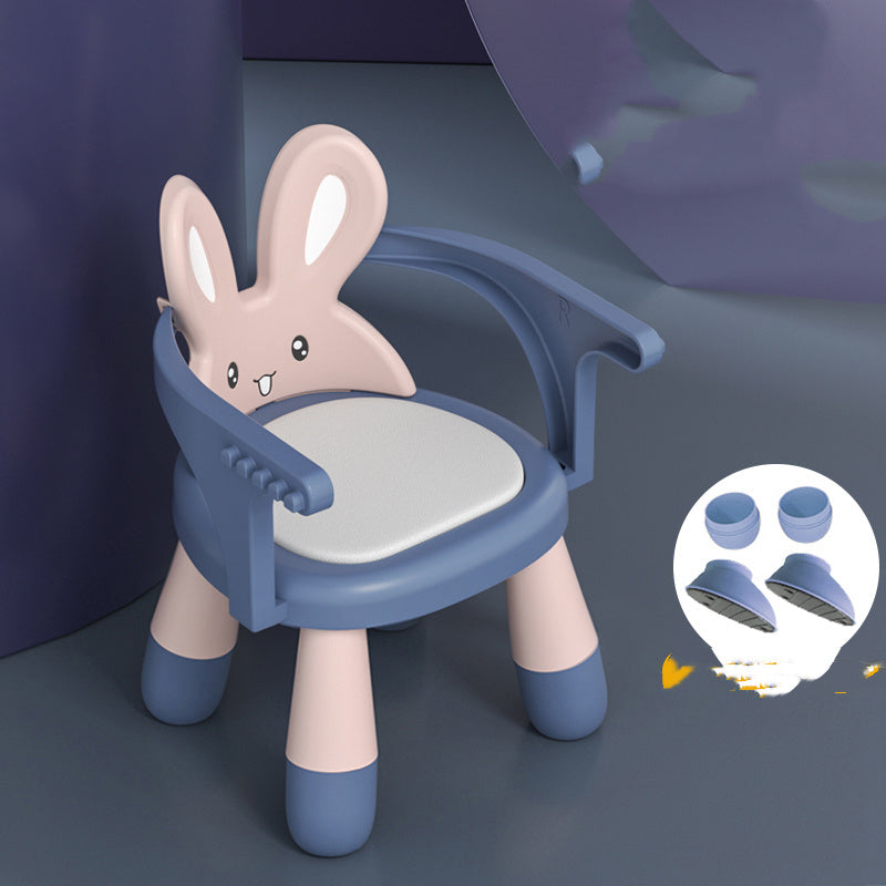 Children's chair with rabbit design on a dark background