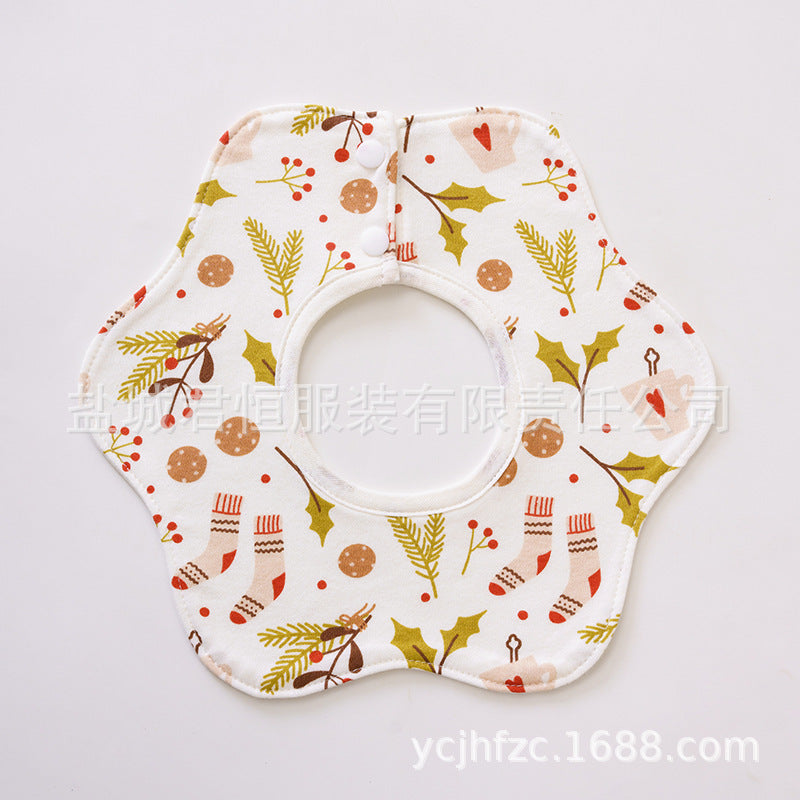 Baby bib with Christmas-themed pattern on a white background