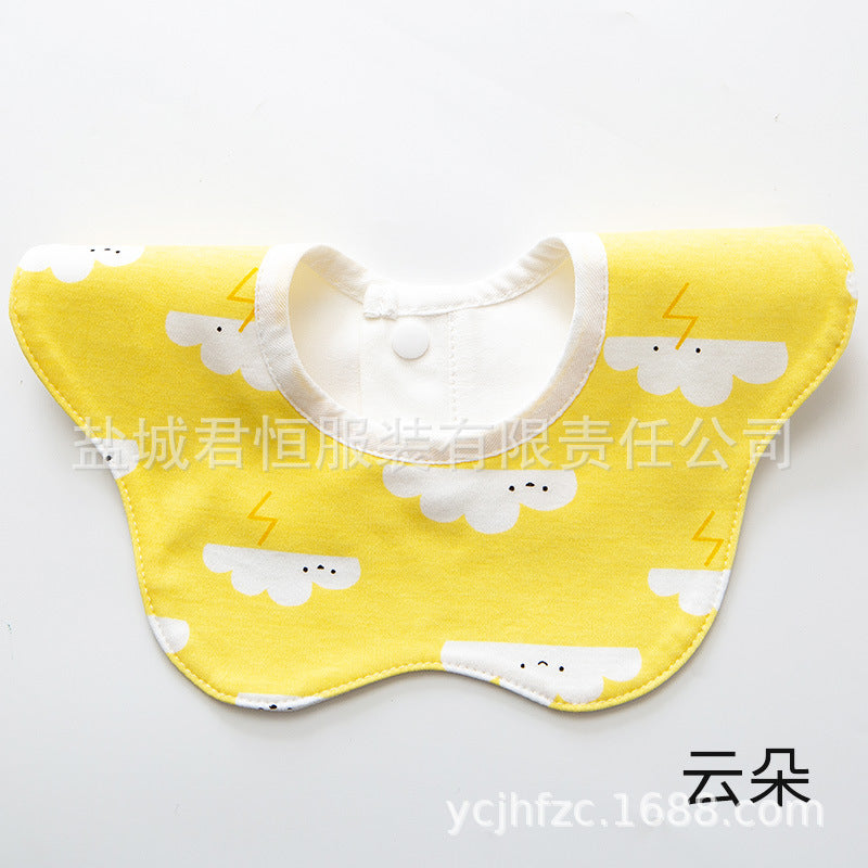 Yellow bib with cloud and lightning bolt pattern on a white background