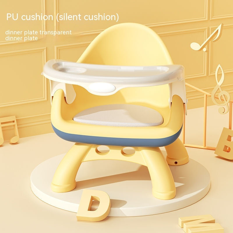 Yellow children's chair with cushion on a light yellow background