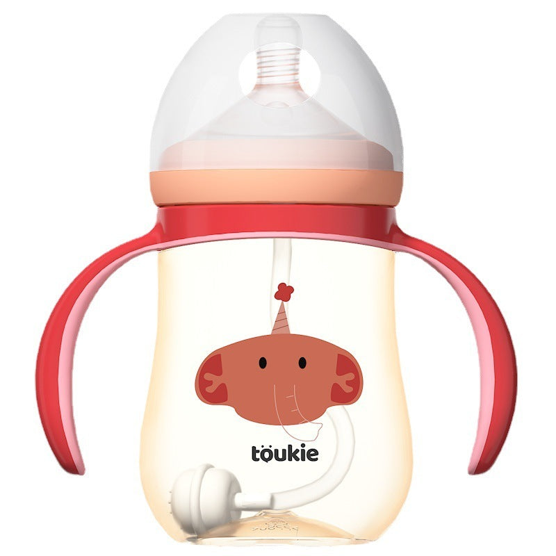 Baby bottle with red handles and a cartoon character on a white background