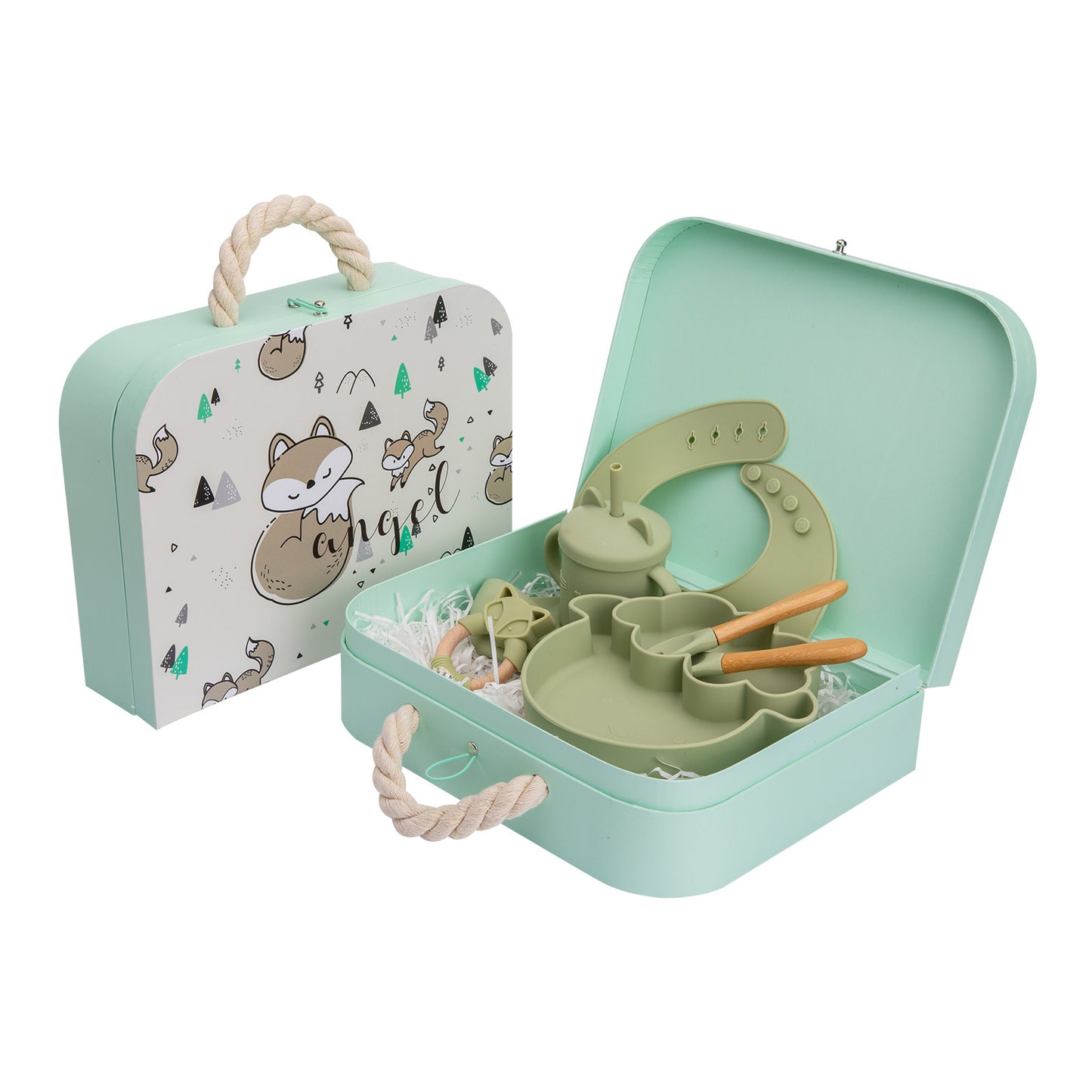 Children's tableware set with green dishes and cutlery in a mint green case on a white background