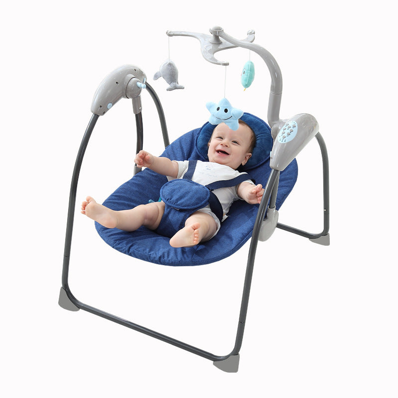 Baby in a blue baby swing with toys on a white background