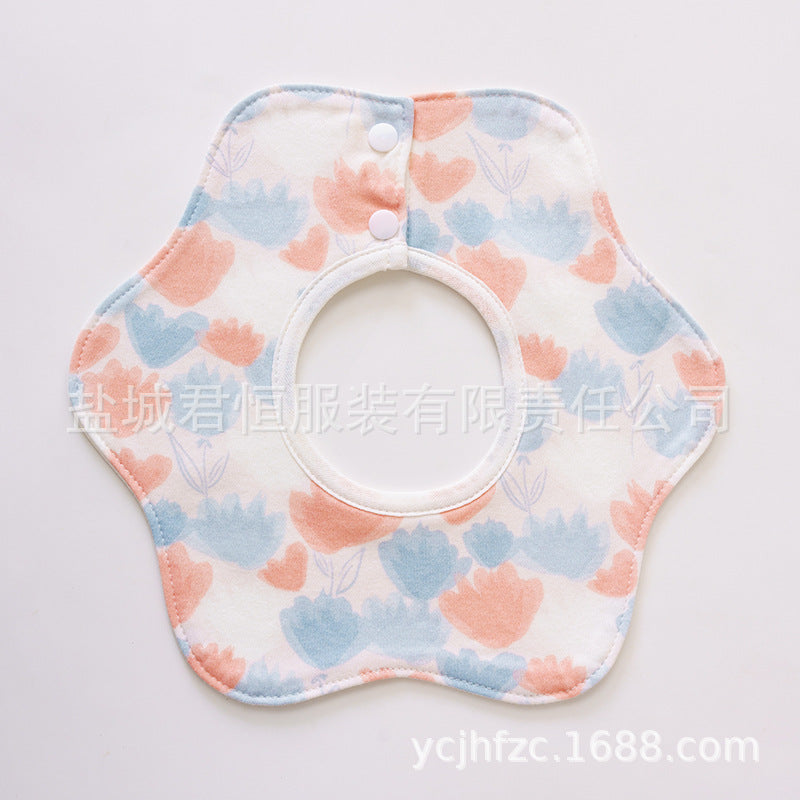 Baby bib with floral pattern on a white background