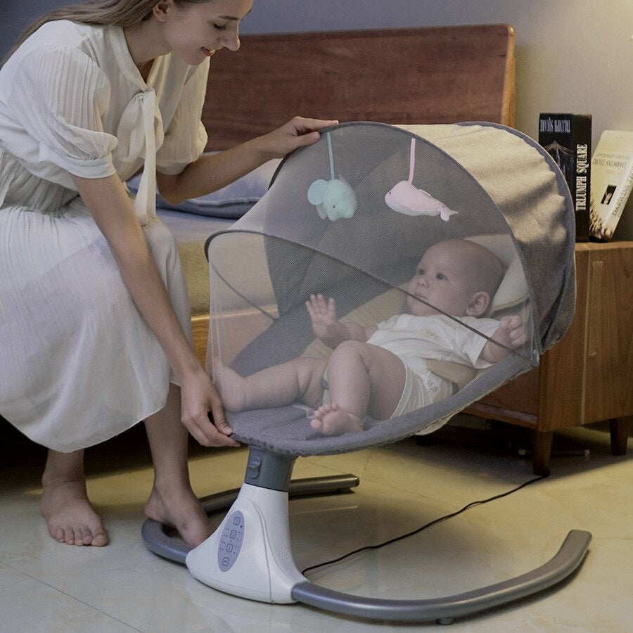 Nestacular electric baby rocking chair in cherry blossom powder, featuring adjustable comfort settings and soothing motion.