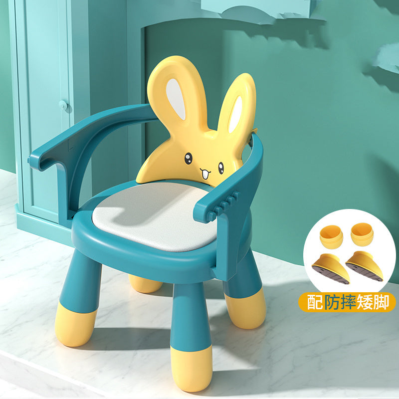 Children's chair with rabbit design in teal and yellow on a light blue background