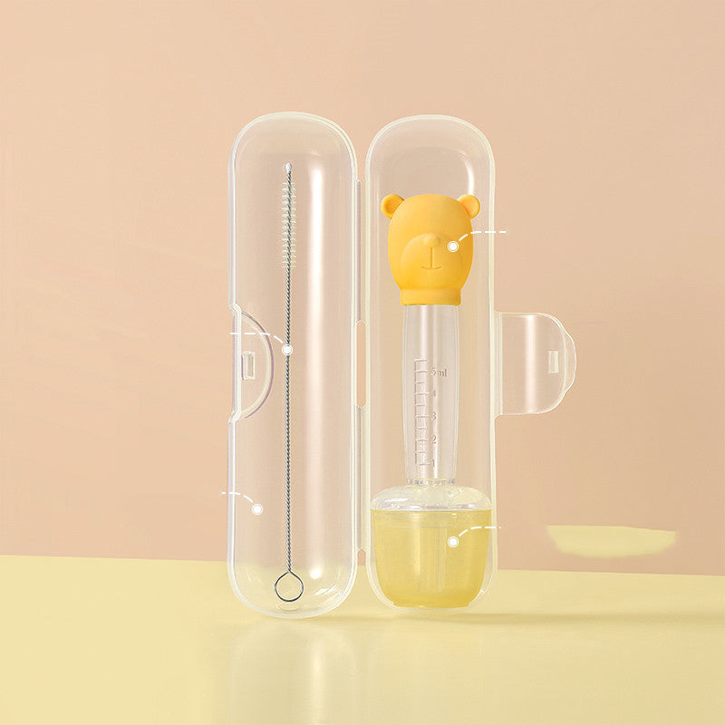 Yellow bear-shaped bottle with a clear case on a beige background