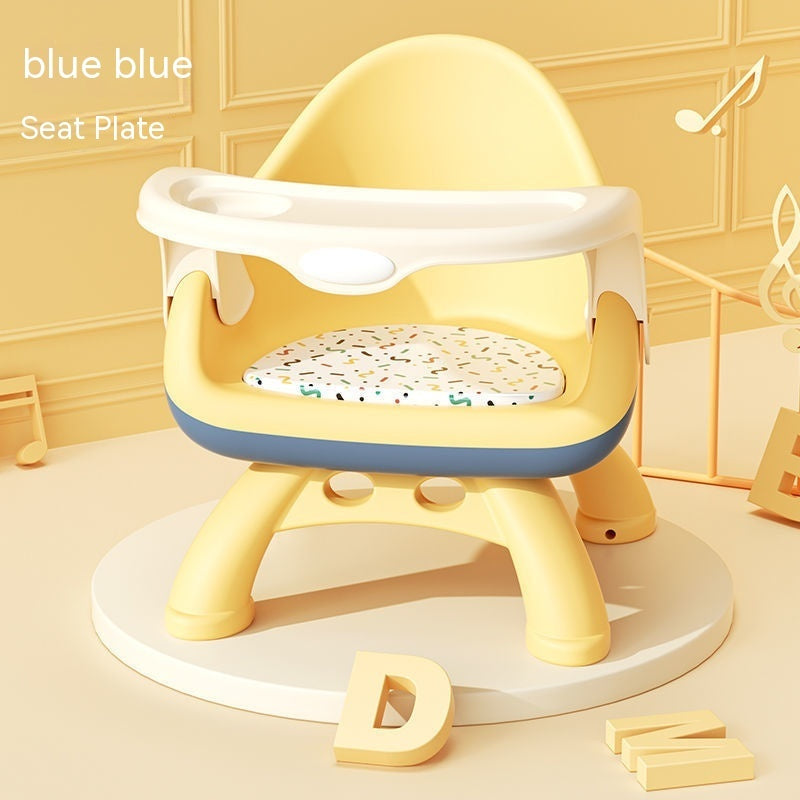 Yellow and blue children's seat with a patterned cushion on a light background