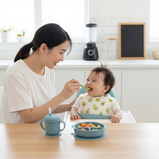 A cheerful baby in a high chair being spoon-fed by a joyful mother.