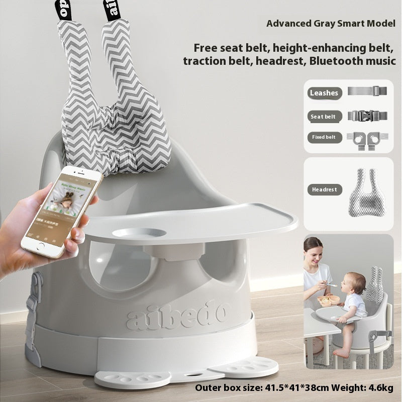 Baby high chair with smartphone app interface, multiple belts, and family using the chair.