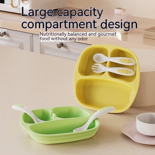 Yellow and green compartmentalized plates with utensils on a kitchen counter.